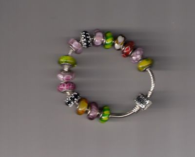 Silver  Bracelet  Complete with  Pandora  Beads