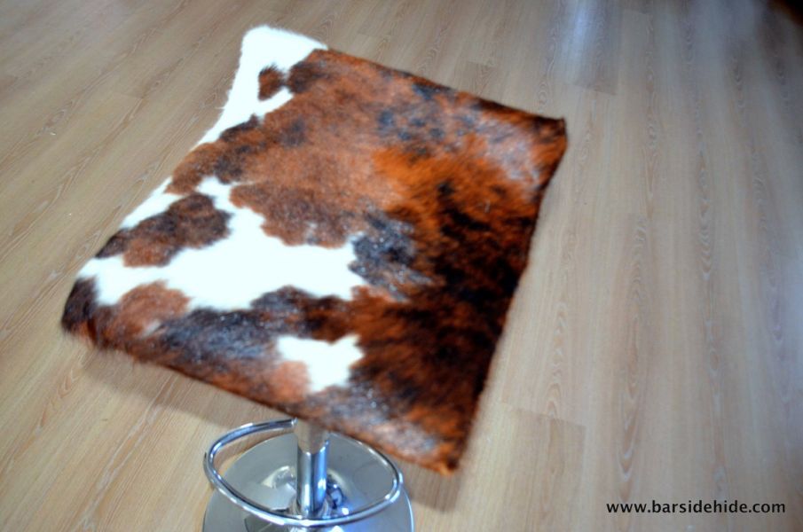 Cowhide rugs and stools